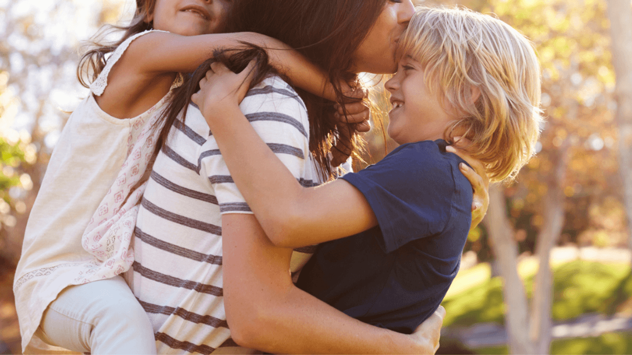 Mom outside with son and daughter
