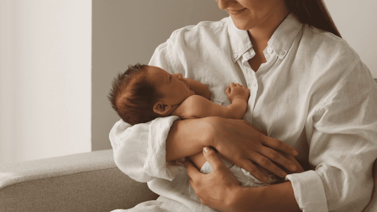 Mother holding a newborn baby.