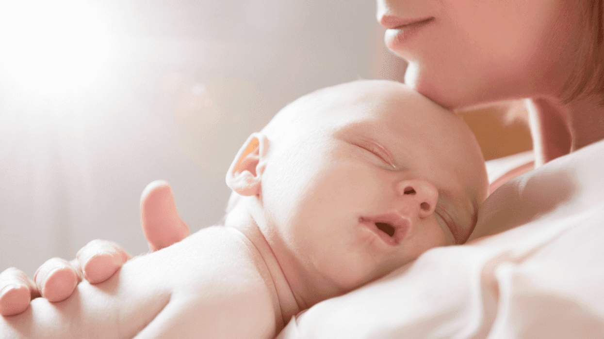 Mother holding newborn baby