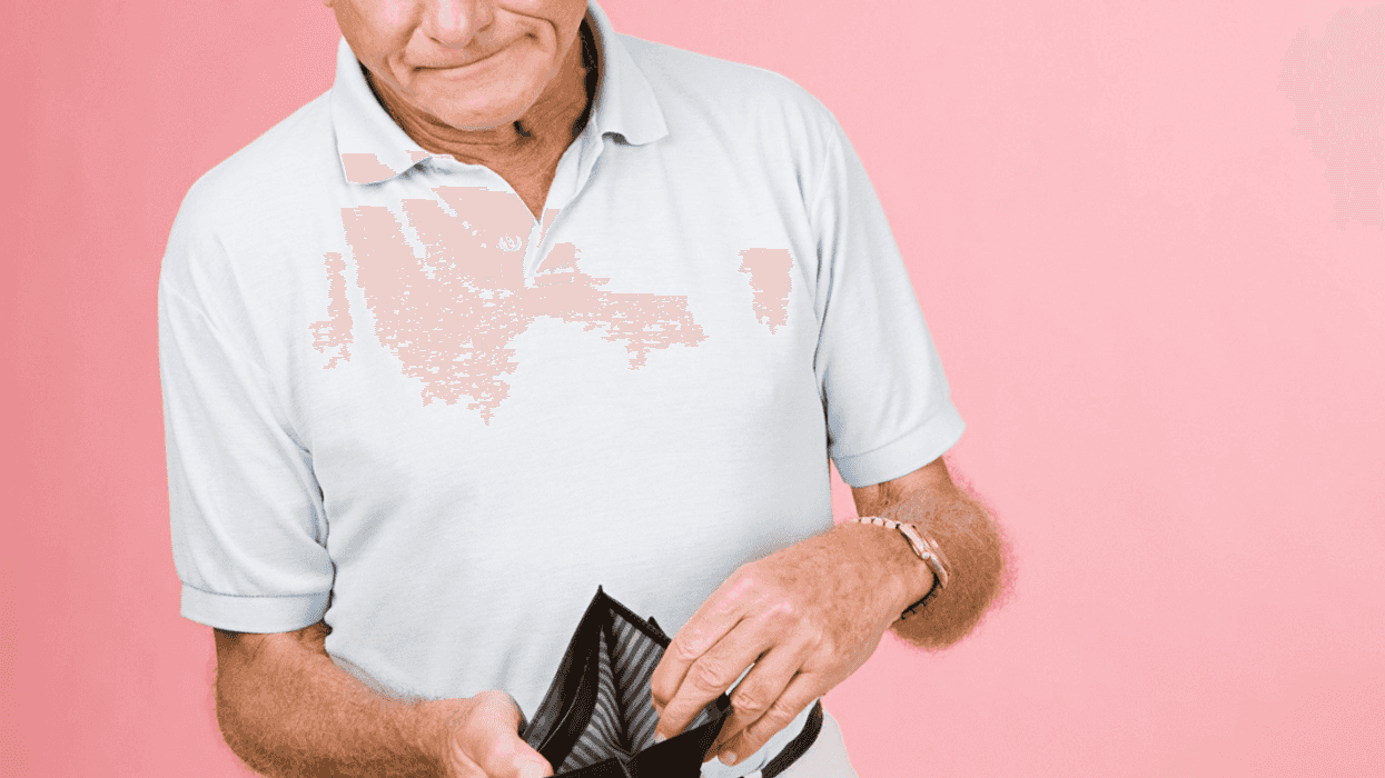 older man with empty wallet