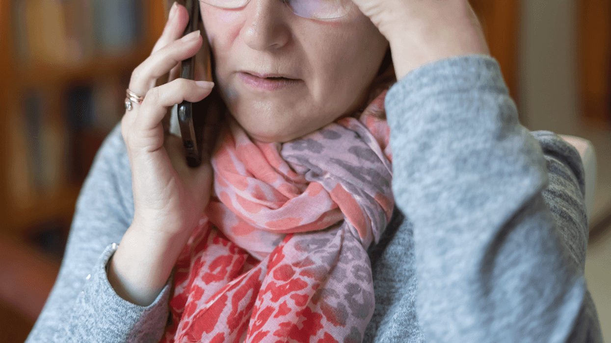 older woman speaking on cellphone