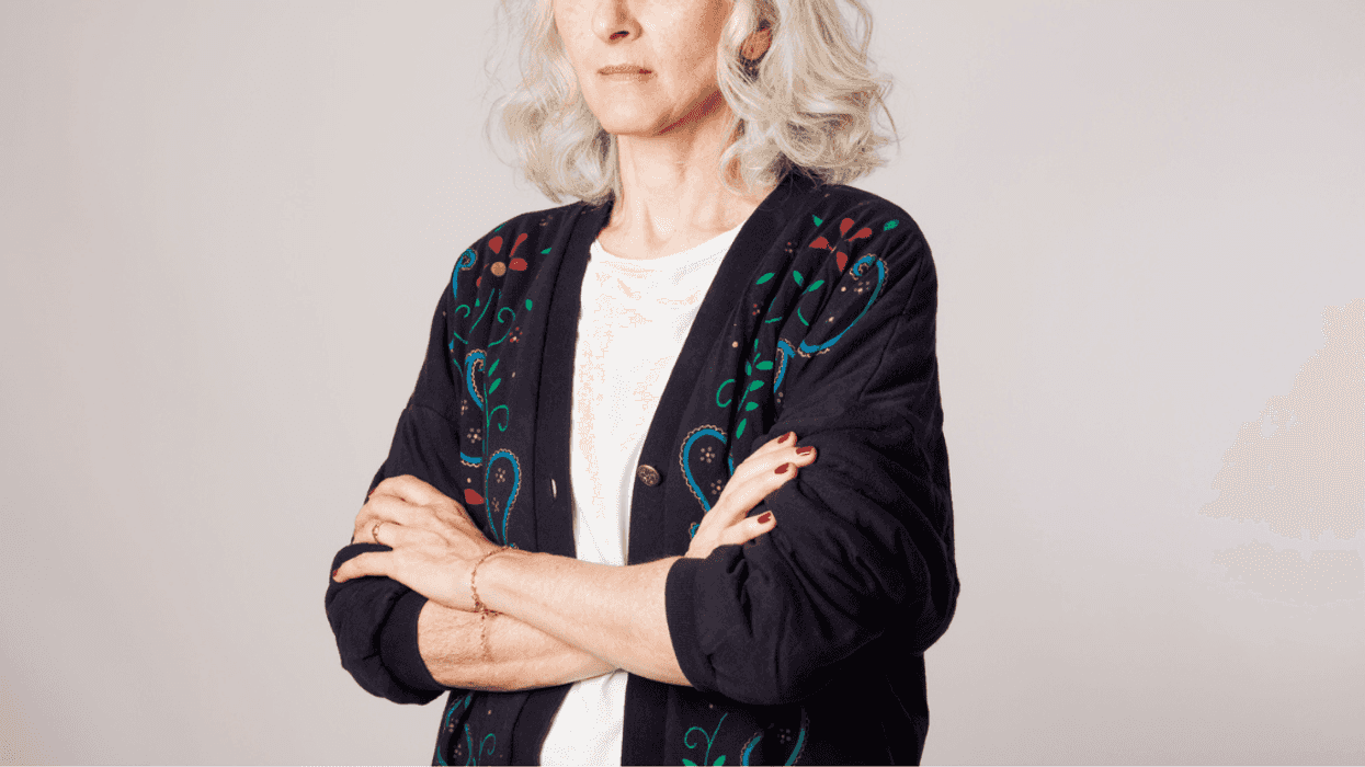 Older woman with her arms crossed