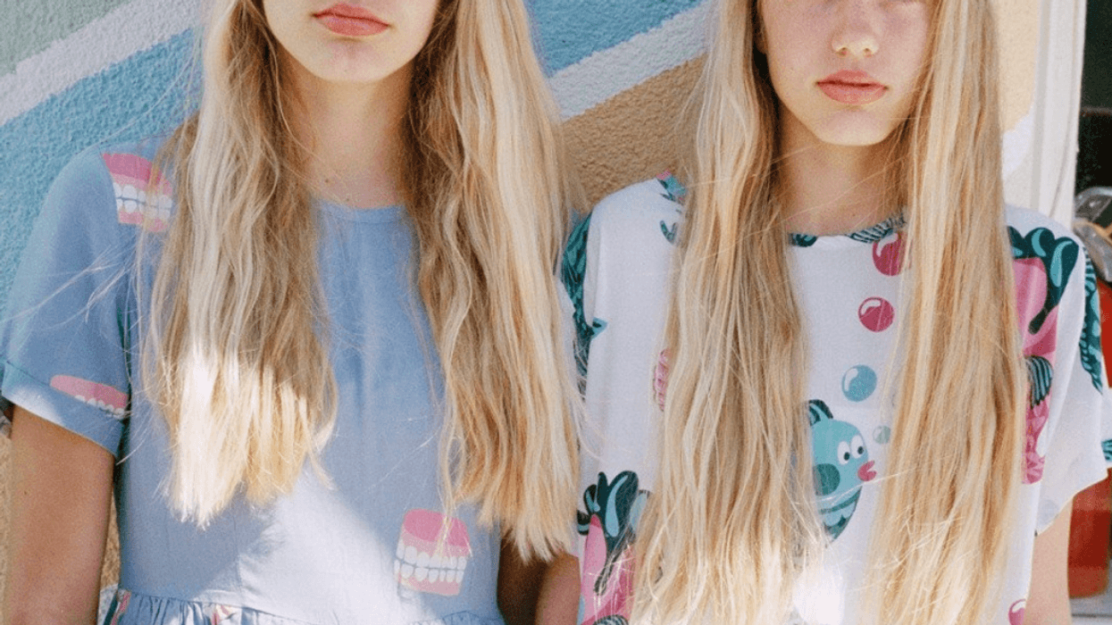 Pair of "tomboy" teens unhappy to be wearing dresses