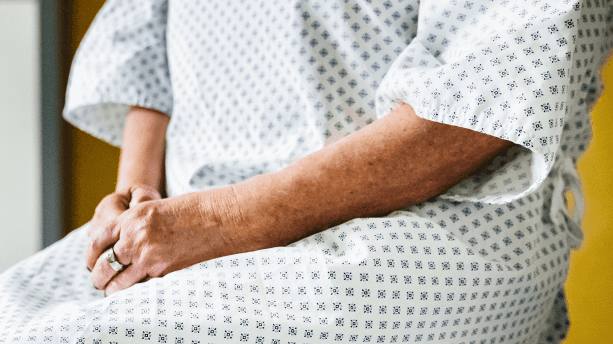 Patient sitting alone in a hospital