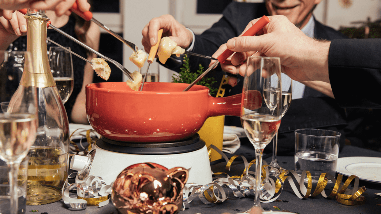 people eating fondue during the holidays