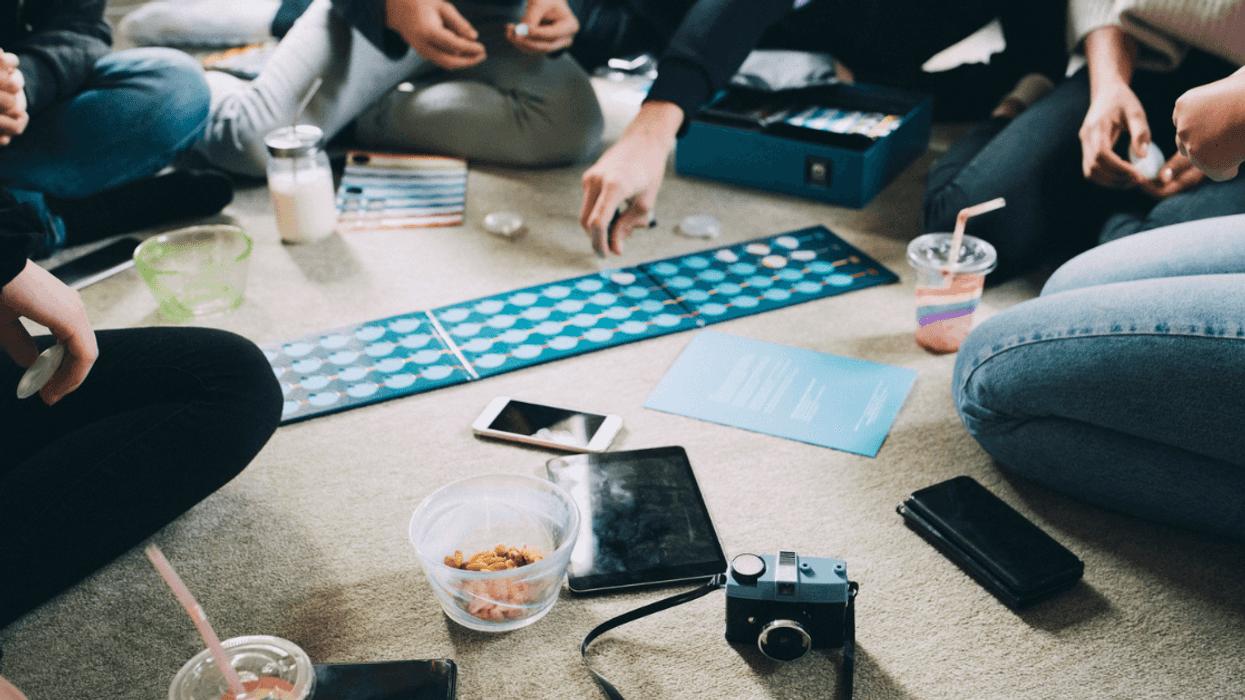 People playing a party game.