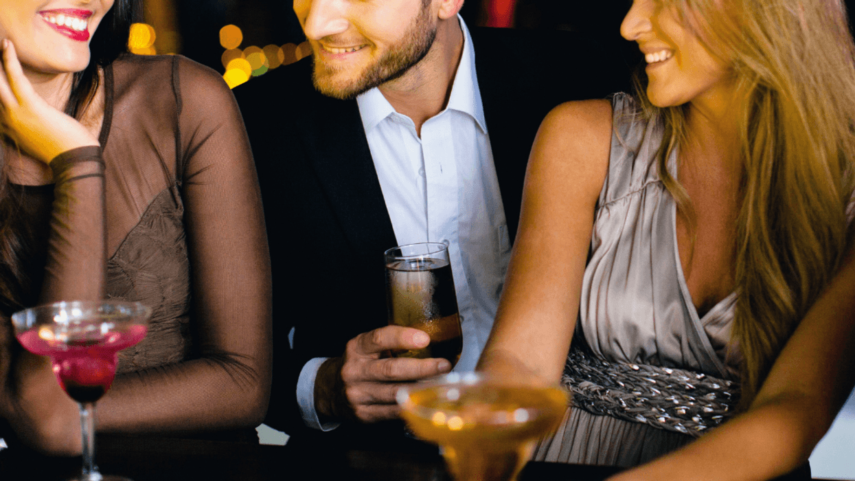 people sharing drinks in a bar