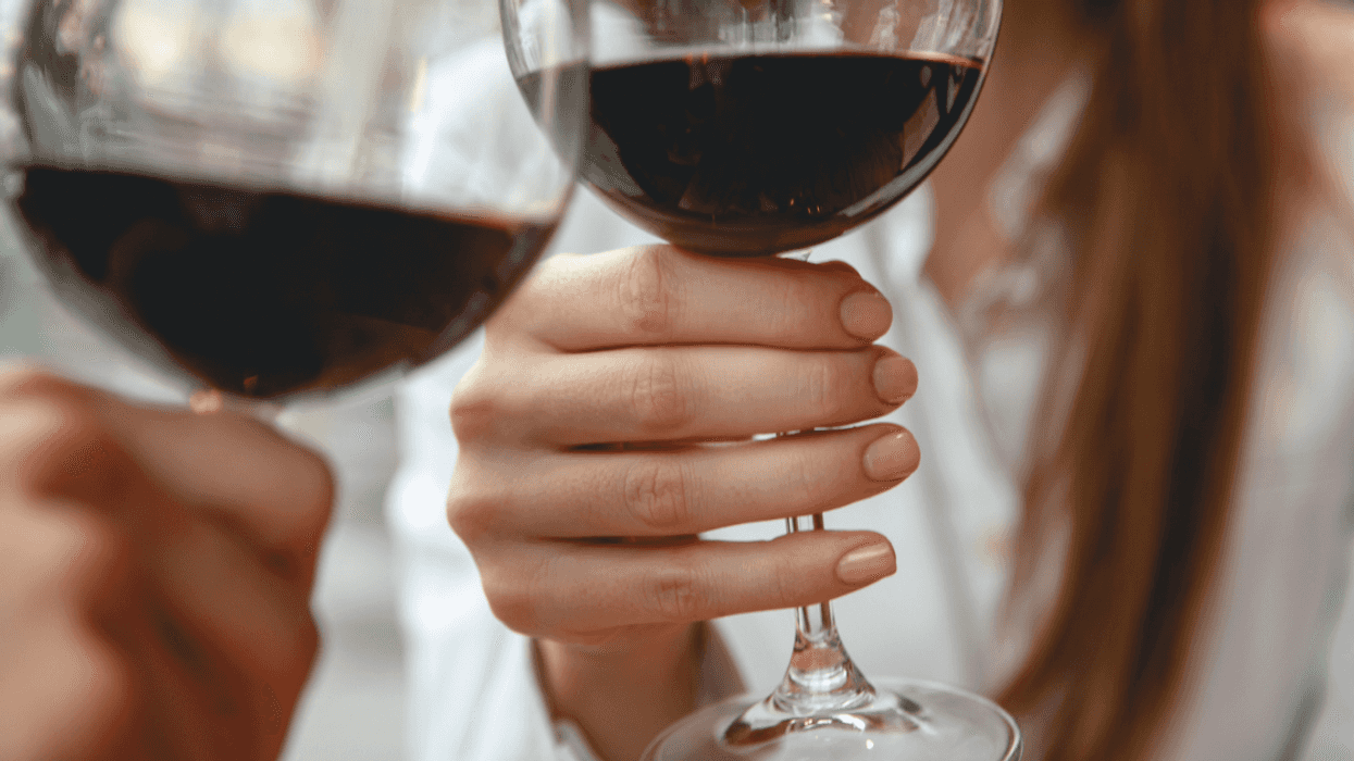 People toasting with glasses of wine