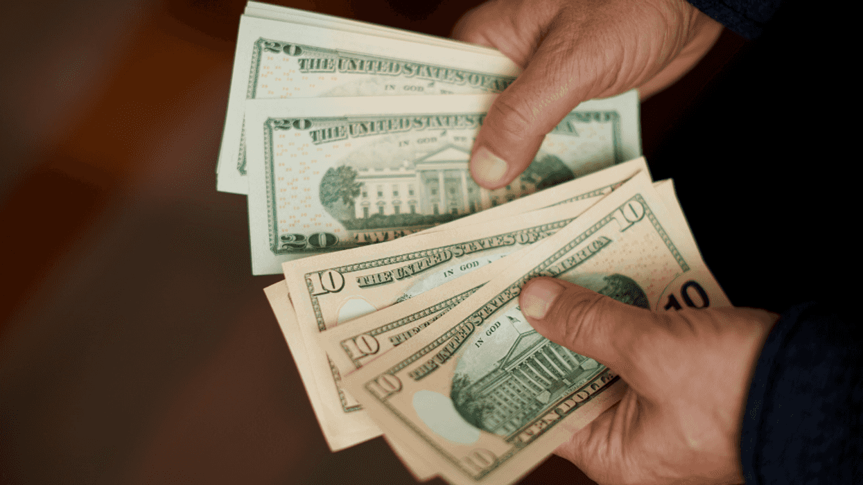 person counting money