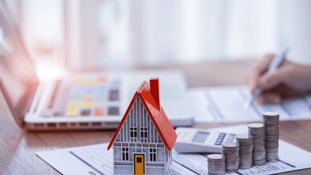 person filling out loan paperwork