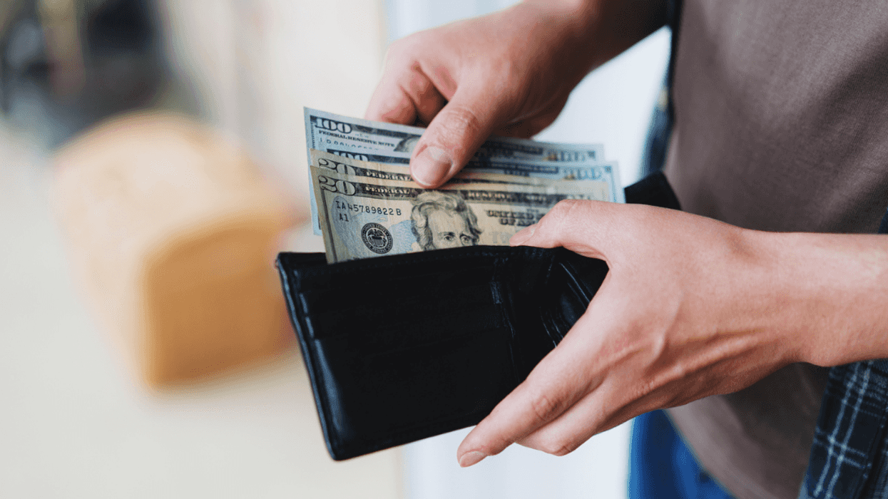 Person giving someone else money