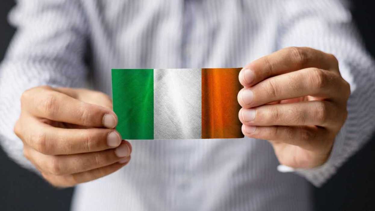 Person holding Irish flag