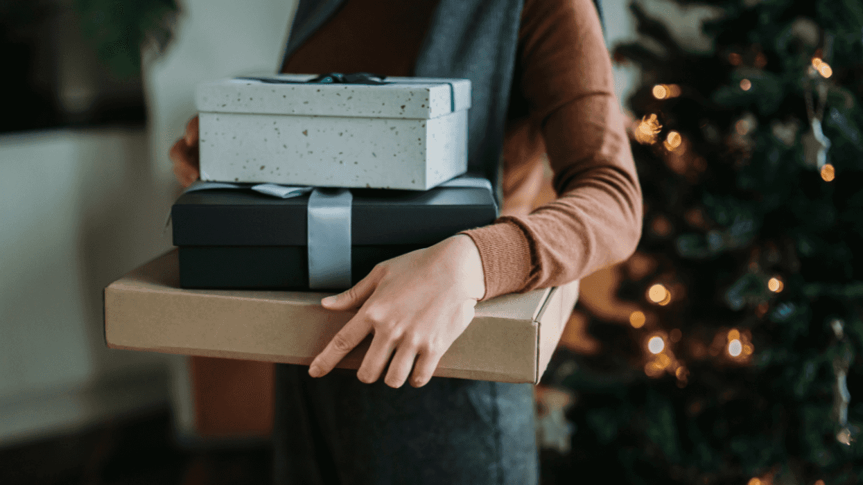 Person holding presents
