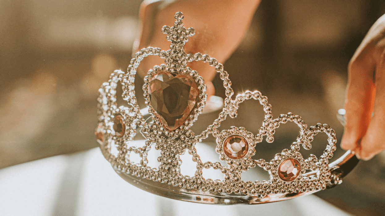 person holding tiara