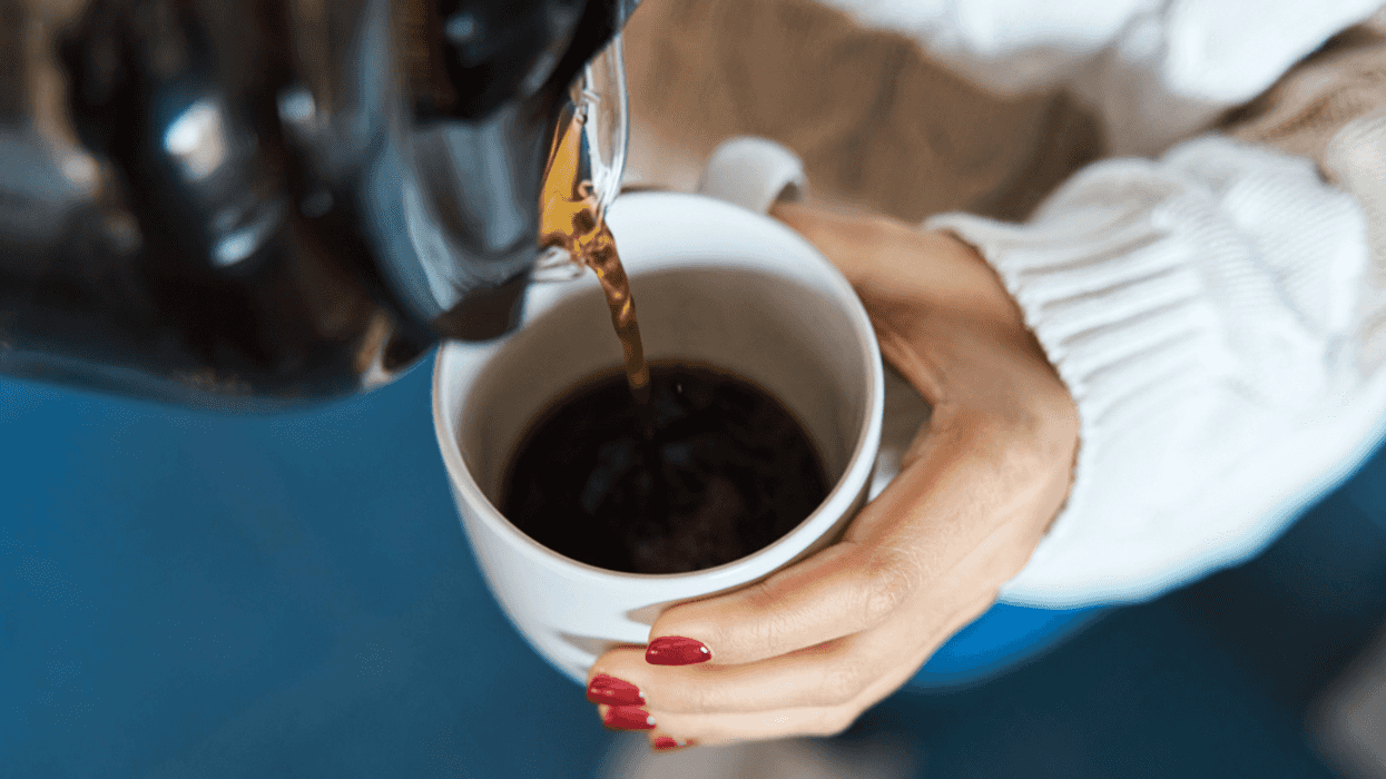 Person making coffee at home