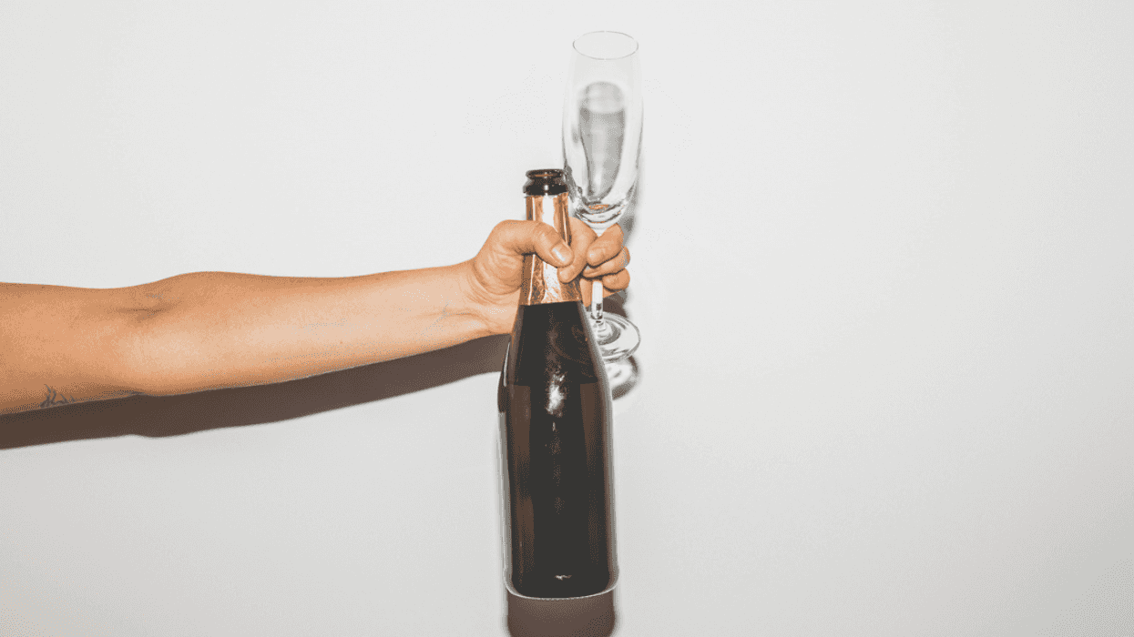 Person offering champagne