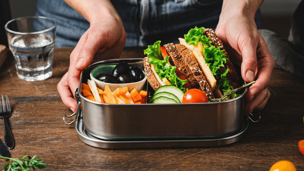 Person opening their lunch box