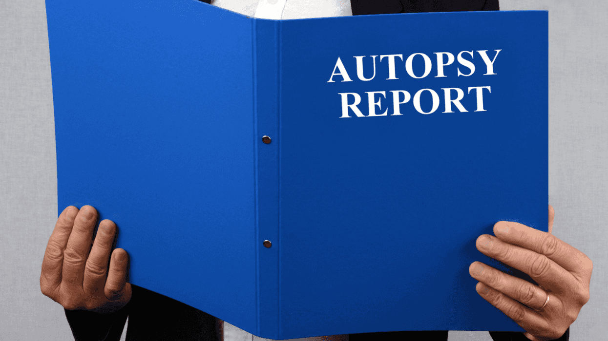 Person reading an autopsy report