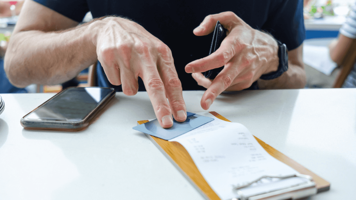 Person splitting the bill
