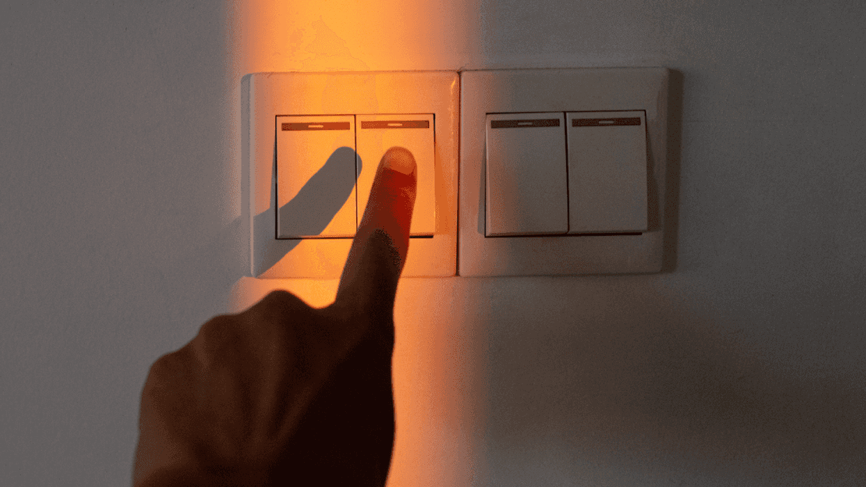 person turning off lights