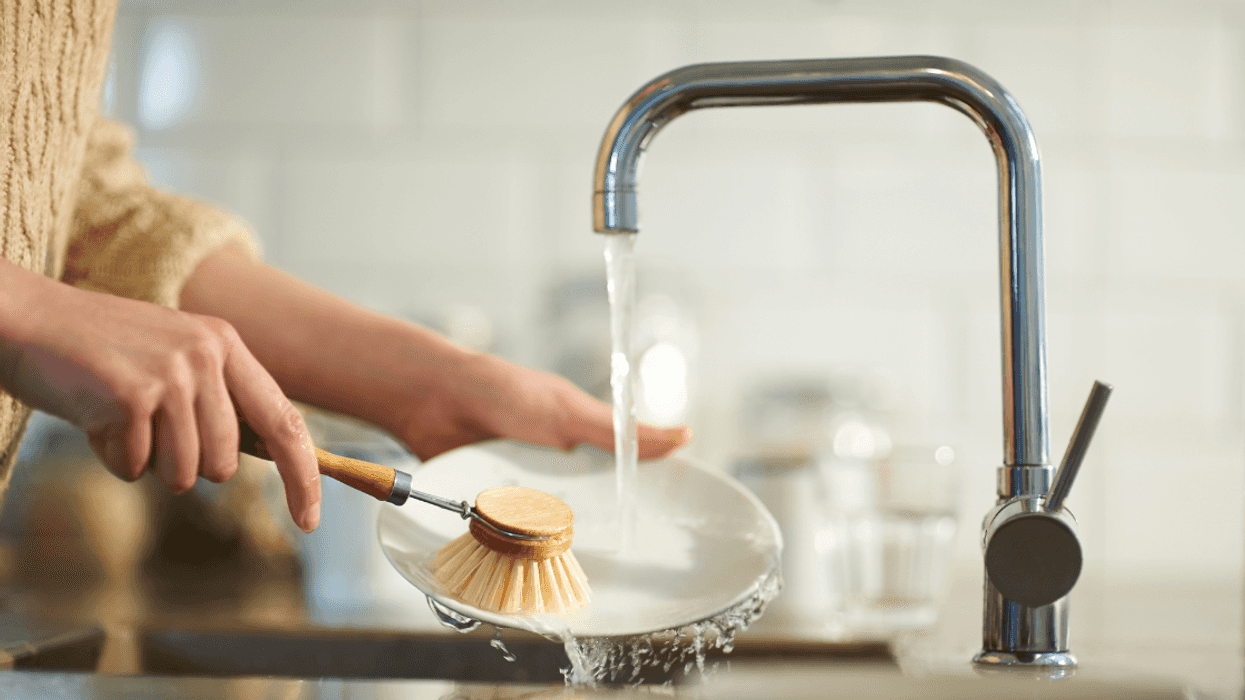 Person washing dishes