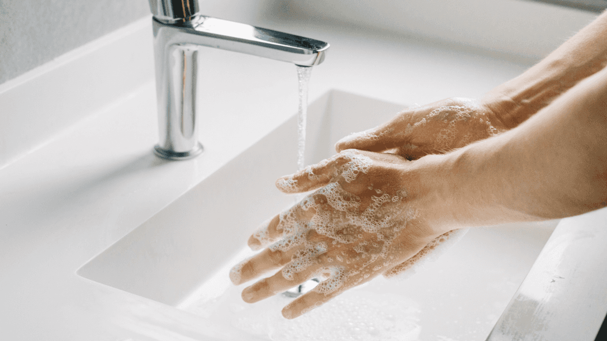Person washing their hands