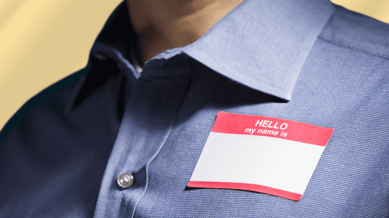Person wearing a 'Hello, My Name Is' name tag