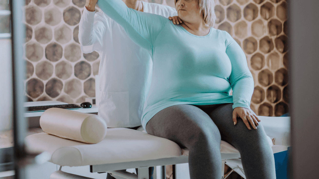 Plus-sized woman getting massage