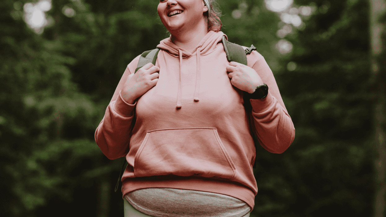Plus-sized woman hiking