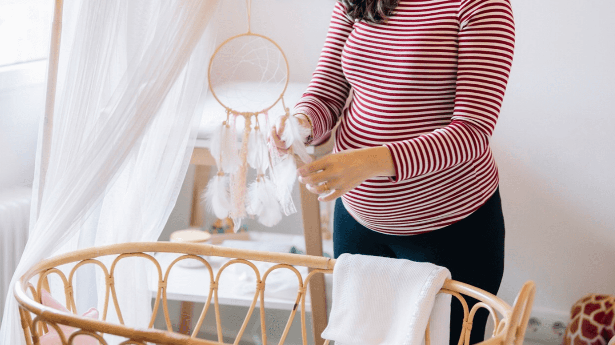 Pregnant mom in nursery
