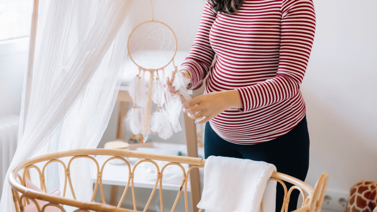 Pregnant mom in nursery