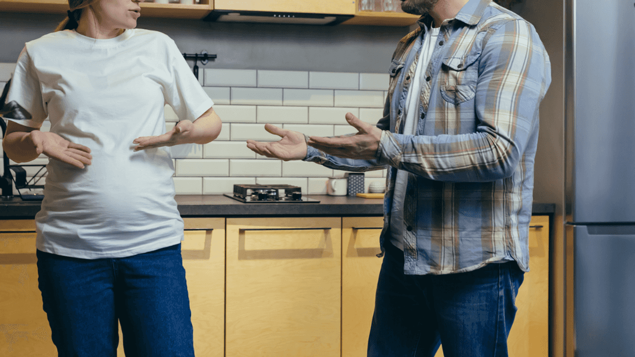pregnant woman arguing with husband.