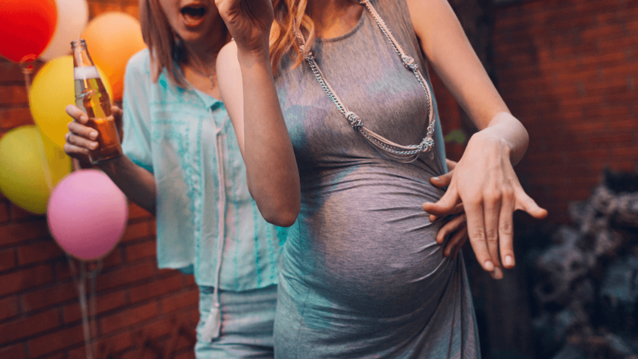 Pregnant woman at party
