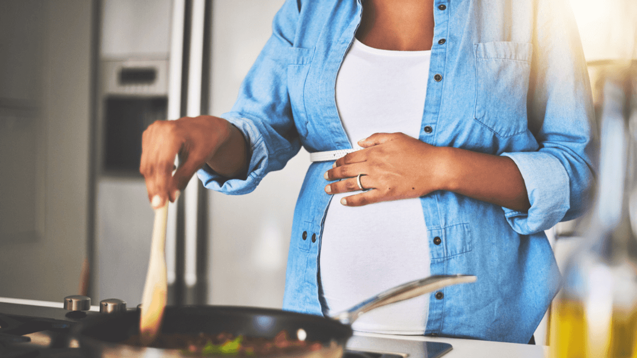 pregnant woman cooking