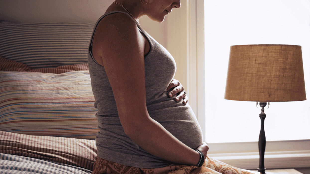 Pregnant woman in bed