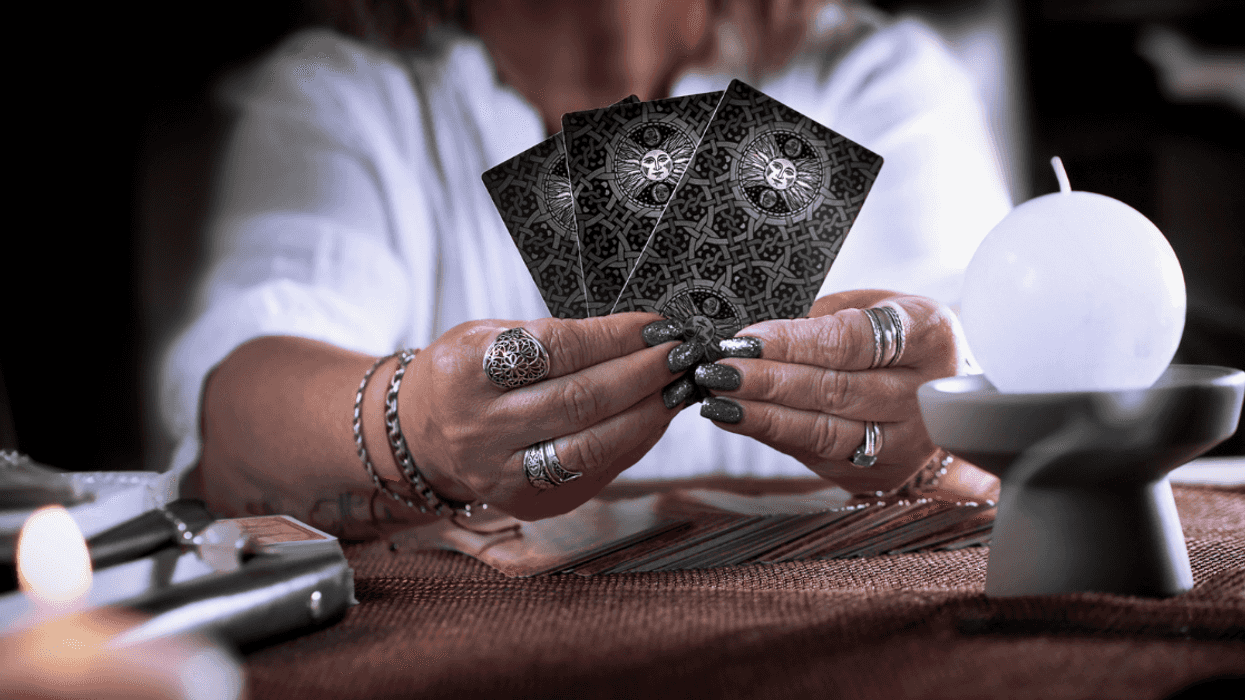 Psychic performing tarot reading
