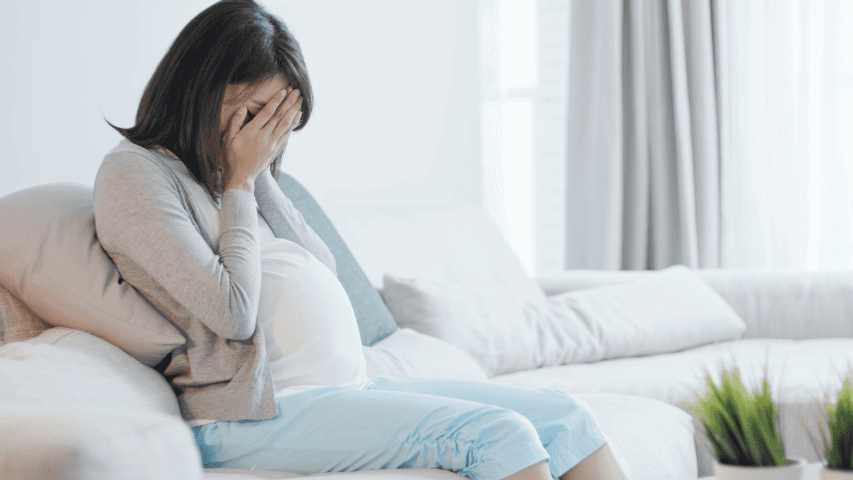 Sad pregnant woman