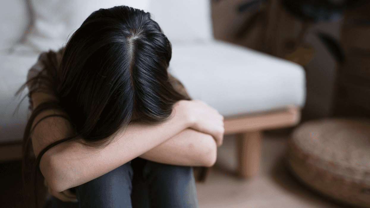 Sad Teenage girl in her room.