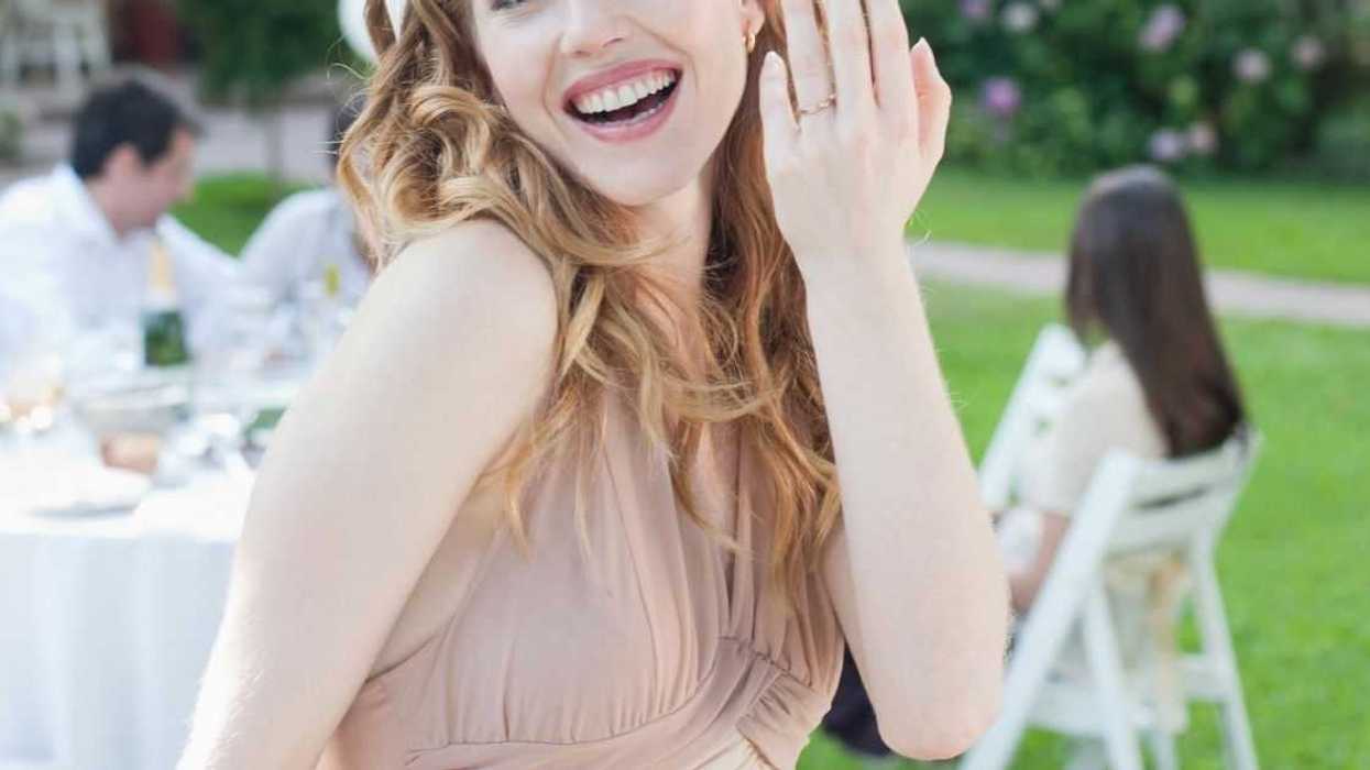 Bride Considers Deleting Wedding Photos Of Friend After Discovering She Got Engaged At Her Wedding