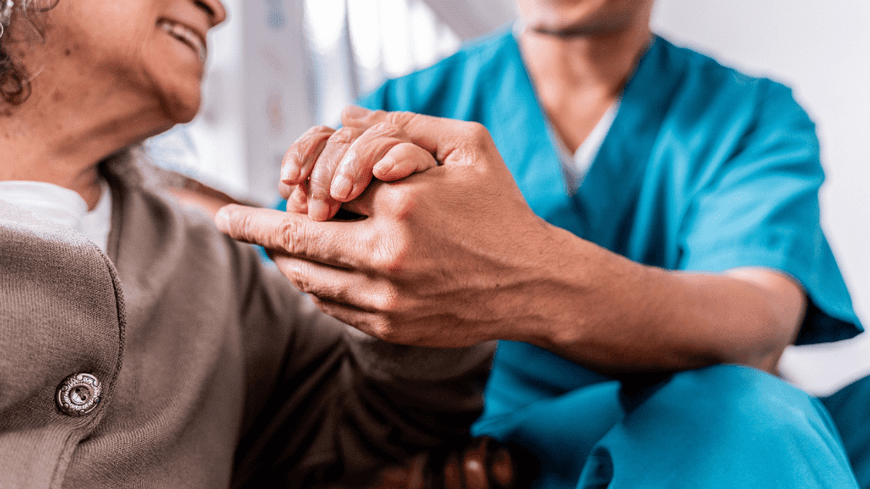 Senior woman with nurse