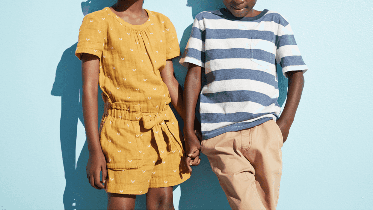 Seven-year-old boy and girl holding hands
