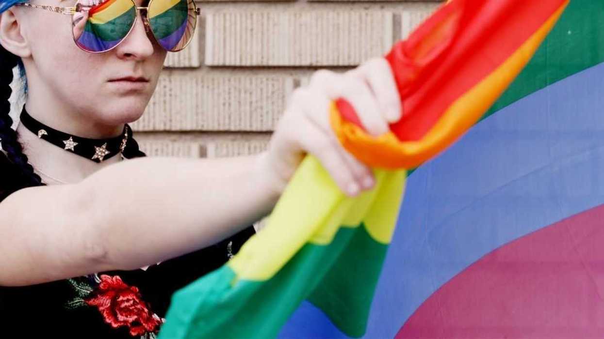 Guy Furious After Lesbian Sister Calls Cops On Him For Stealing Her And Her Wife's Pride Flag