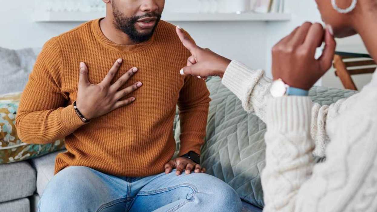 Shot of a young couple having an argument at home.
