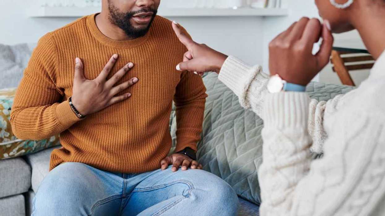 Shot of a young couple having an argument at home.