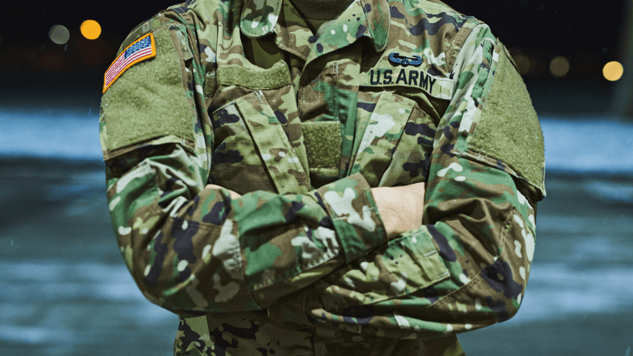 Soldier with arms crossed