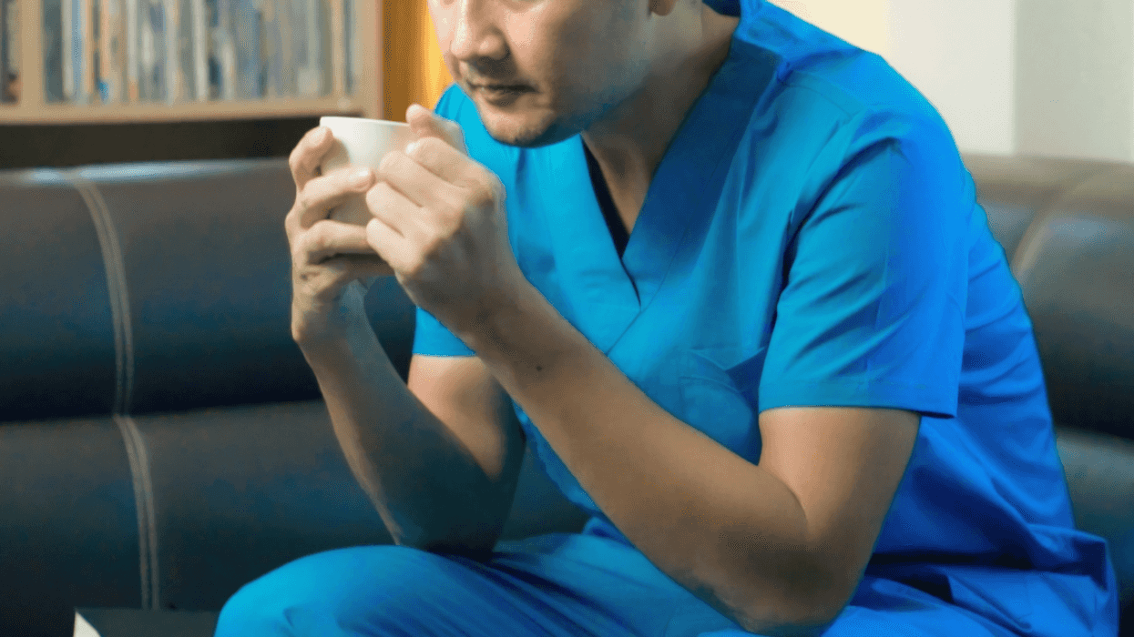 stressed nurse relaxes at home