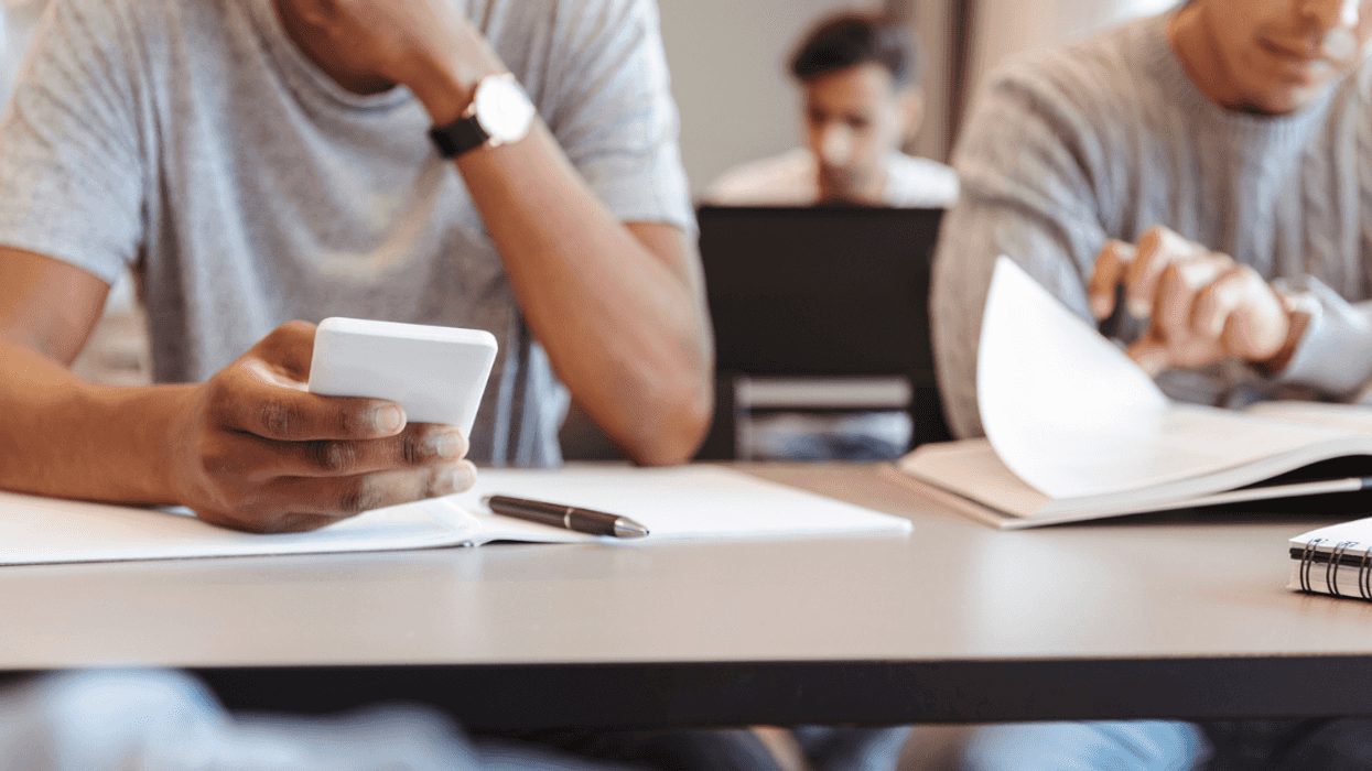 Student using cell phone during class