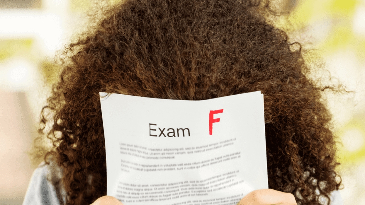 Teen girl embarrassed by bad grades