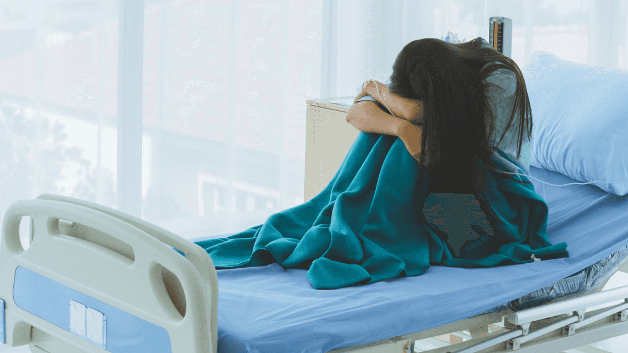 teen girl in hospital bed