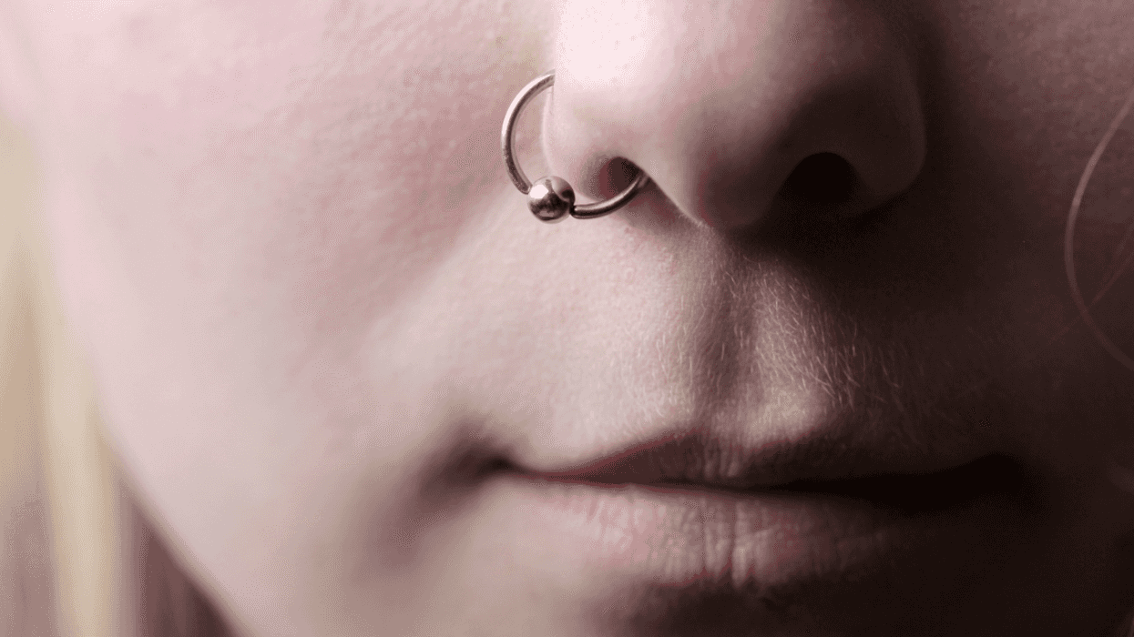 Teen girl with nose piercing